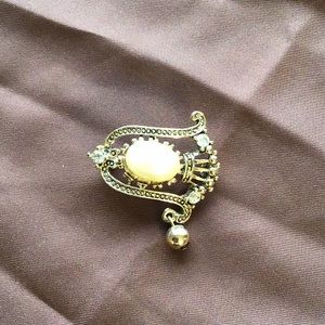 Broach pin.       E